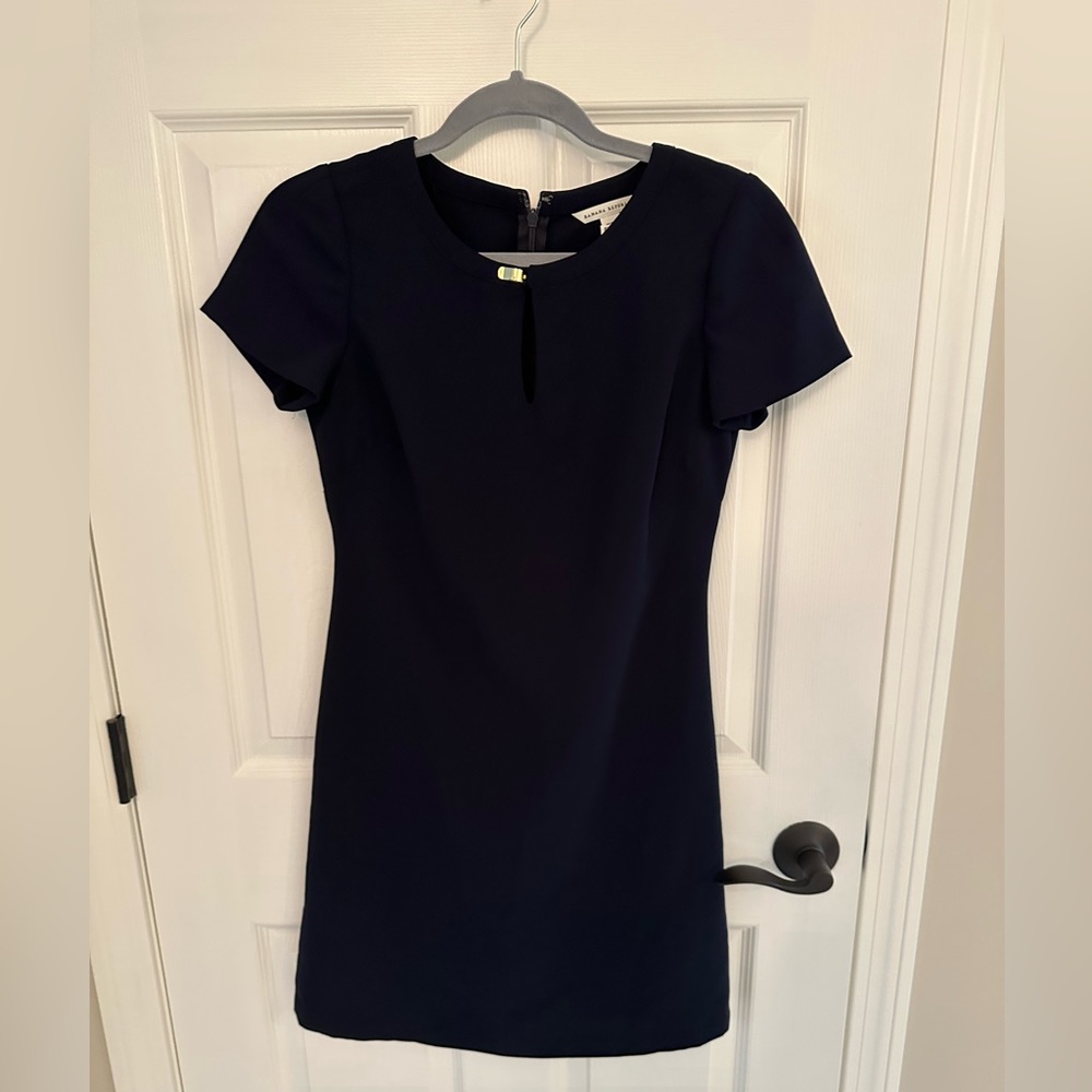 Banana republic. Navy blue short sleeved dress with gold clip at neckline